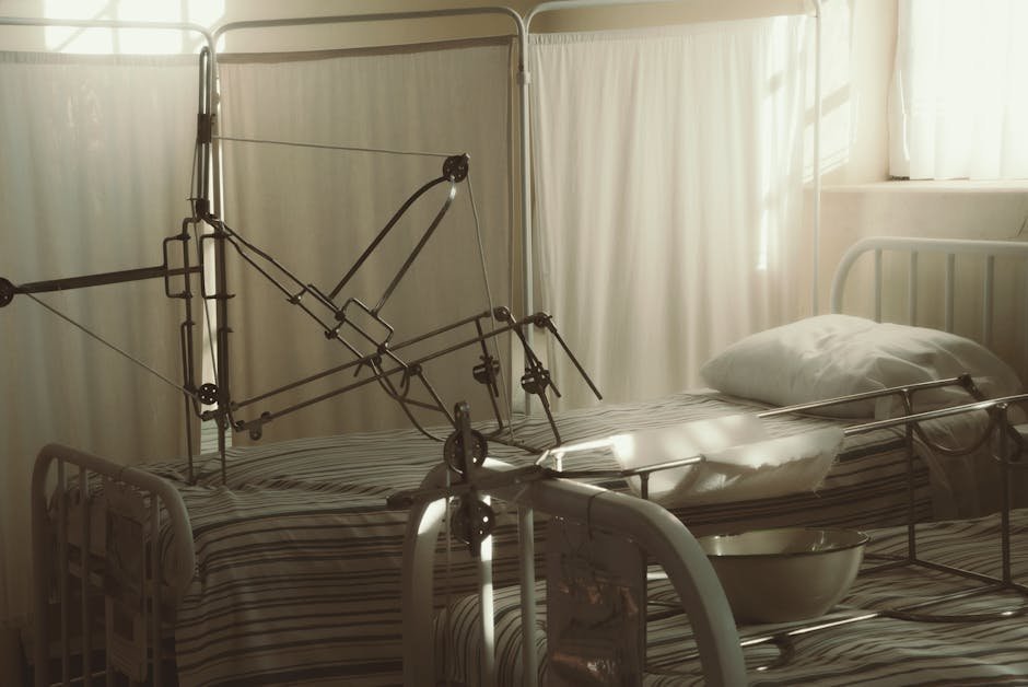Patient sitting on a hospital bed in a calm psychiatric inpatient unit during anxiety hospitalization