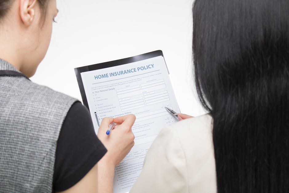 Patient and therapist reviewing insurance pre-authorization paperwork together